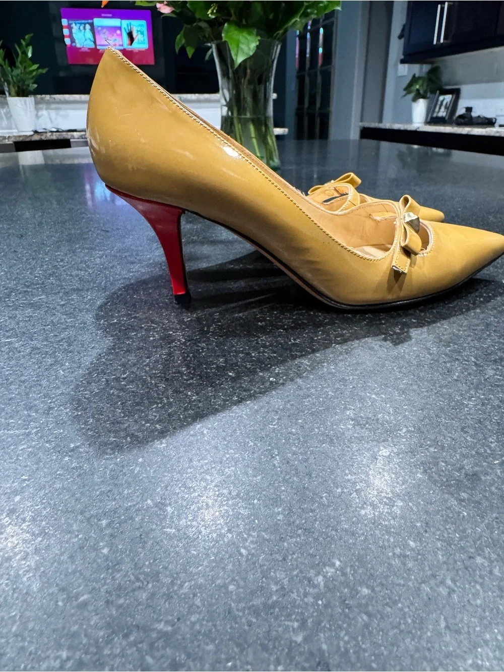 kate spade Tan Patent Pointed-Toe Pumps with Bow Detail and Red heel